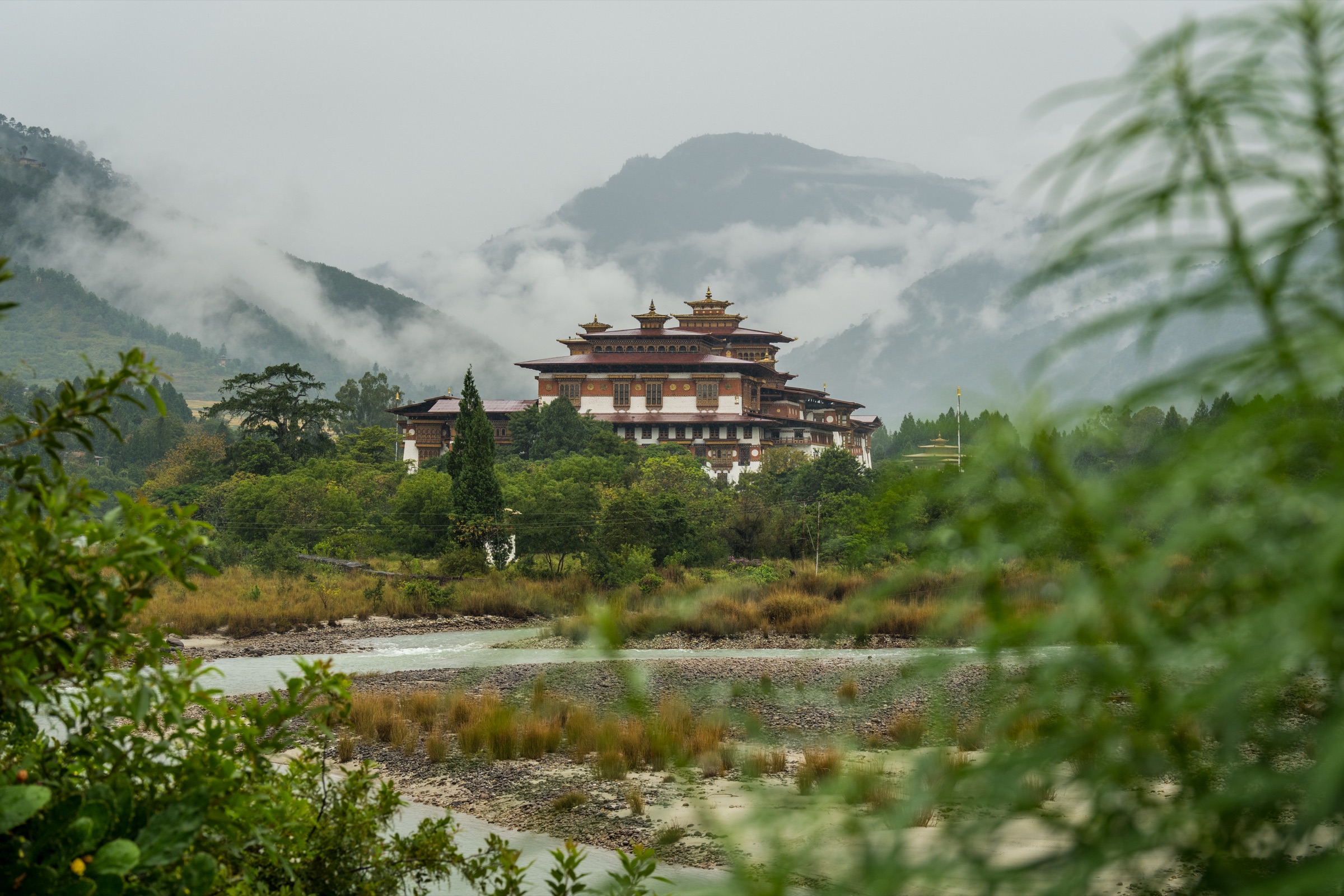 Punakha Dzong and valley in soft mist